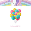 A bunch of colorful balloons in yellow, pink, and teal are shown with strings for a unicorn party kit.