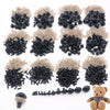 A collection of plastic safety eyes for amigurumi in various colors and sizes, including black, beige, and clear.