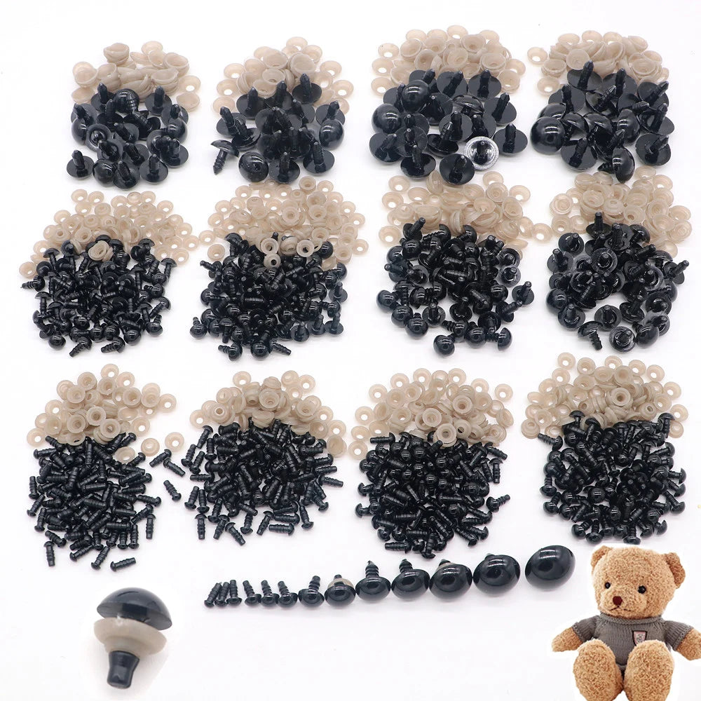 A collection of plastic safety eyes for amigurumi in various colors and sizes, including black, beige, and clear.