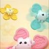 Pink and yellow suction cup spinner bath toys featuring cute animal figures for toddlers