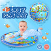 A circular baby play mat featuring colorful aquatic and learning designs, shown with a baby interacting with it.