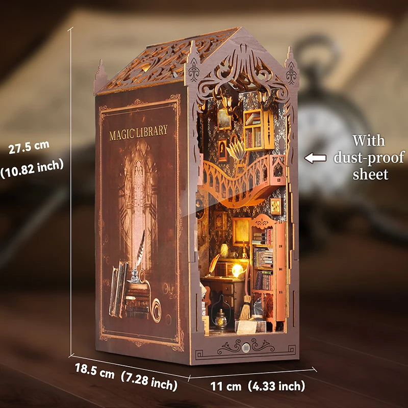A detailed miniature magic library box with intricate carvings and internal lighting.