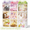 A multi-level miniature dollhouse set featuring nine themed rooms with furniture and accessories.