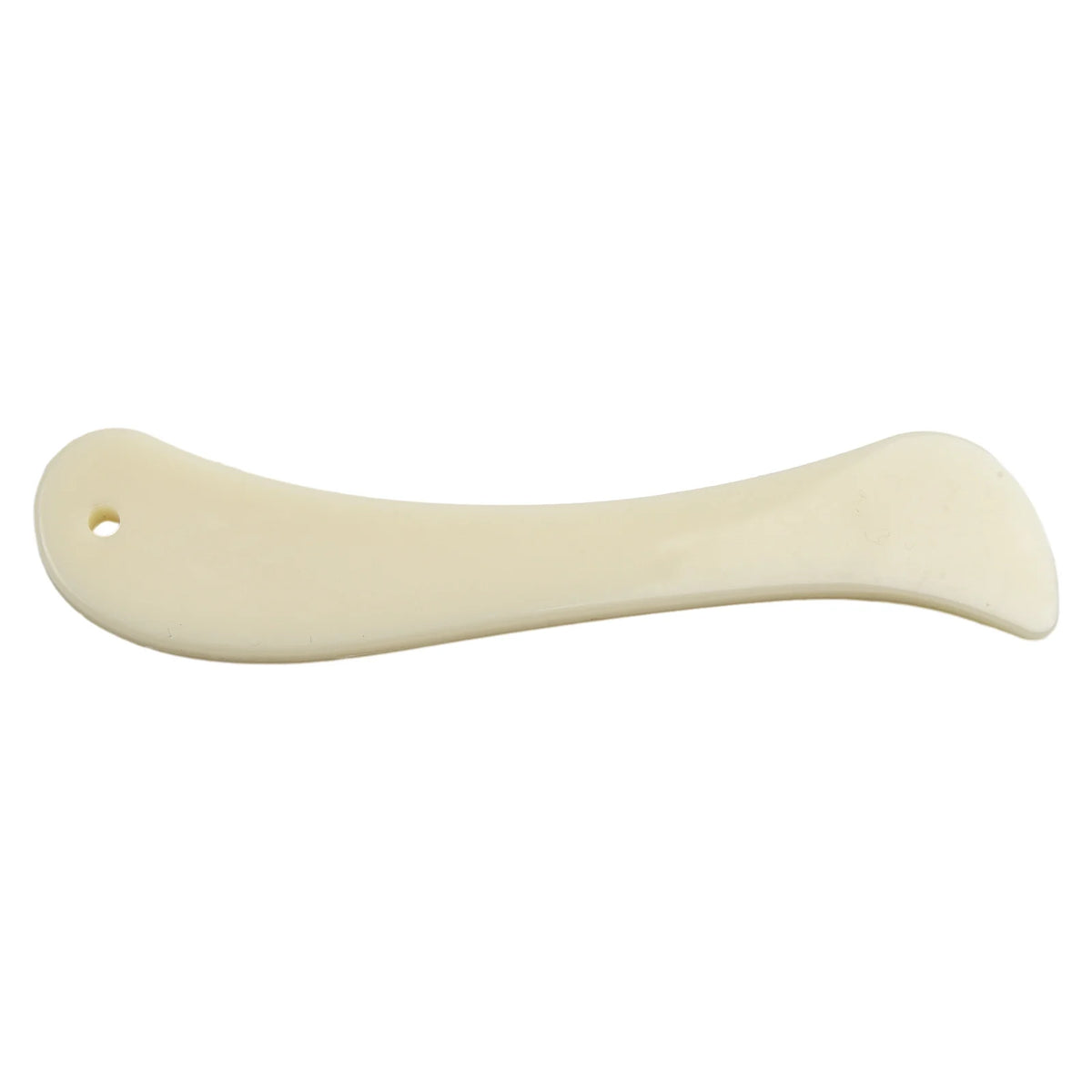 A light beige plastic bone folder used for paper creasing and folding crafts.