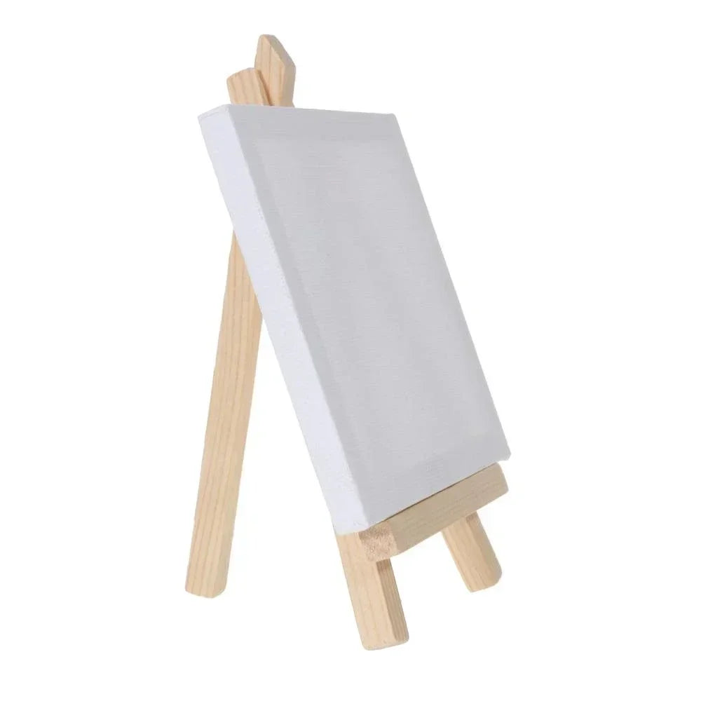 A mini wooden easel with a white canvas board for kids' art projects.