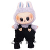 A plush doll dressed in gray fluffy overalls and black pants with a light blue nose.