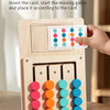 A wooden color matching puzzle game with cards and a mechanism for playing.