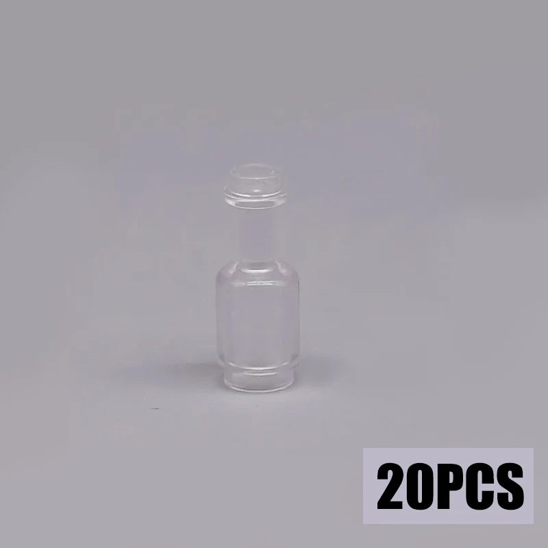A clear glass bottle with a narrow neck, packaged as a 20-piece treasure chest set.
