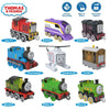A collection of Thomas & Friends diecast train characters and toys including Diesel, Kanga, and various engine models.