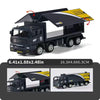 A black pull-back container truck toy with a yellow roof for kids