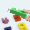 A hand holds a green wooden number building block, demonstrating its size with a 1.2 cm measurement.