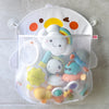 A white storage bag with a duck and frog design featuring various soft toys and a sun graphic.
