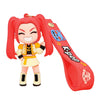 A collectible doll featuring bright red hair and an orange outfit, attached to a red keychain.