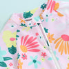 Pink baby rash guard swimsuit with a floral print and a zipper detail