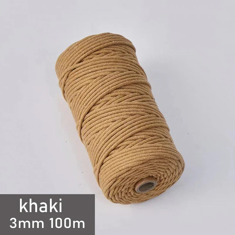 A spool of khaki 3mm cotton macrame cord measuring 100 meters.