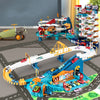 A dinosaur rail car adventure playset featuring a track, building elements, and parking lot for children.