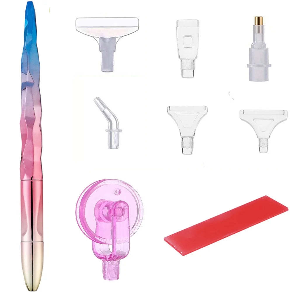 A set of diamond painting tools including a pen, roller tool, and various tips for painting.