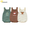 Three knitted baby rompers in green, brown, and cream featuring Christmas embroidery for infants and toddlers