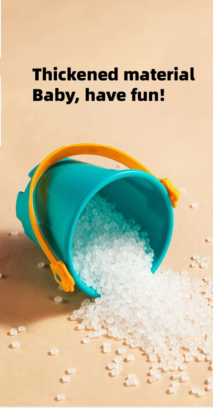 A turquoise bucket filled with thick, white, granular material, likely a sensory play item for children.