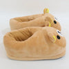 A pair of Kawaii Rilakkuma plush indoor slippers in brown with yellow accents.