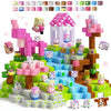 A set of pink and purple magnetic building blocks used to construct a castle structure.