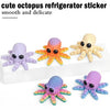 Cute octopus refrigerator stickers in purple and orange colors displayed on a white surface.
