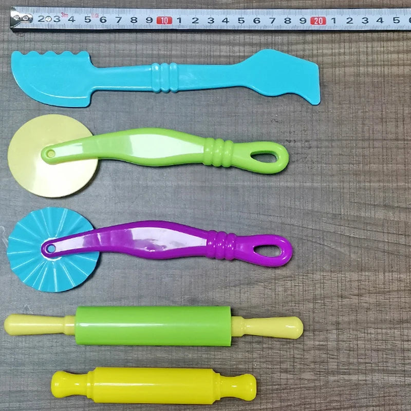 A set of air-dry modeling clay tools and molds in various colors including blue, green, and purple.