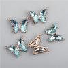 Gold-toned crystal butterfly charm beads used for jewelry making