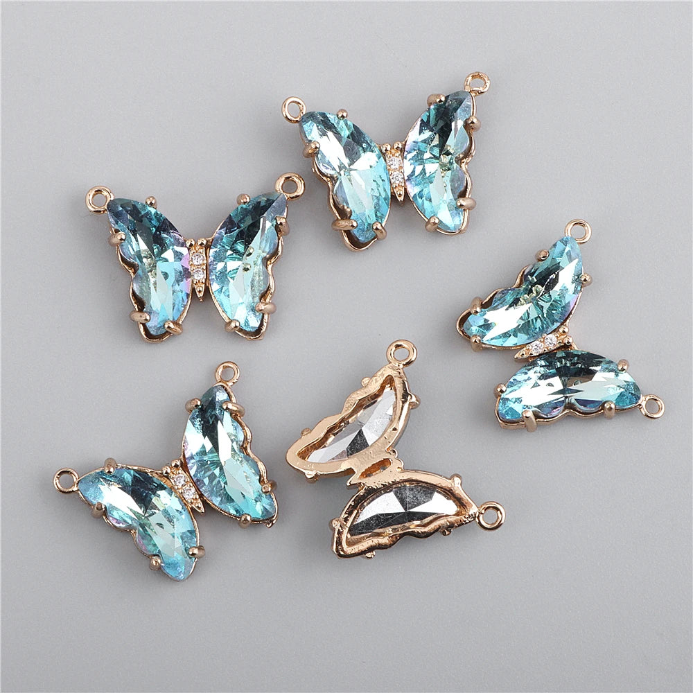 Gold-toned crystal butterfly charm beads used for jewelry making