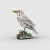 A detailed white animal model built from building blocks, resembling a bird of prey.