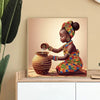 A young African girl is painting a ceramic jar with diamonds, wearing traditional attire and a patterned headwrap.