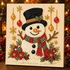 A detailed painting of a smiling snowman made of white pearls and jewels, framed for home decor.