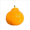 A bright orange tangerine squishy stress relief toy with a green stem.
