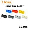 A set of 20 random color liftarm beam building blocks with three holes each.
