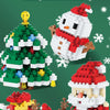 A collection of LEGO building blocks featuring Santa, a snowman, and a reindeer in Christmas themed sets.