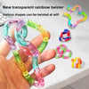 A hand holds several transparent rainbow twist ropes of various colors, demonstrating different twisting shapes.