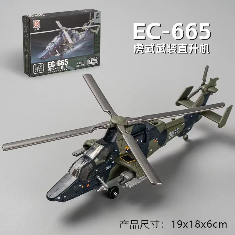 A plastic model kit of an EC-665 helicopter in military camouflage, shown from the side.
