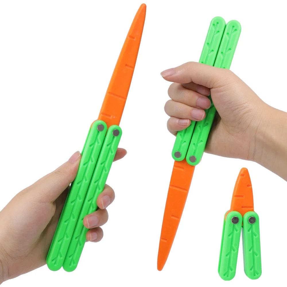 A hand holds an orange and green 3D printed butterfly knife fidget toy with a pointed blade.
