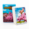A box of the Drecksal card game featuring a pink pig character and a hand.