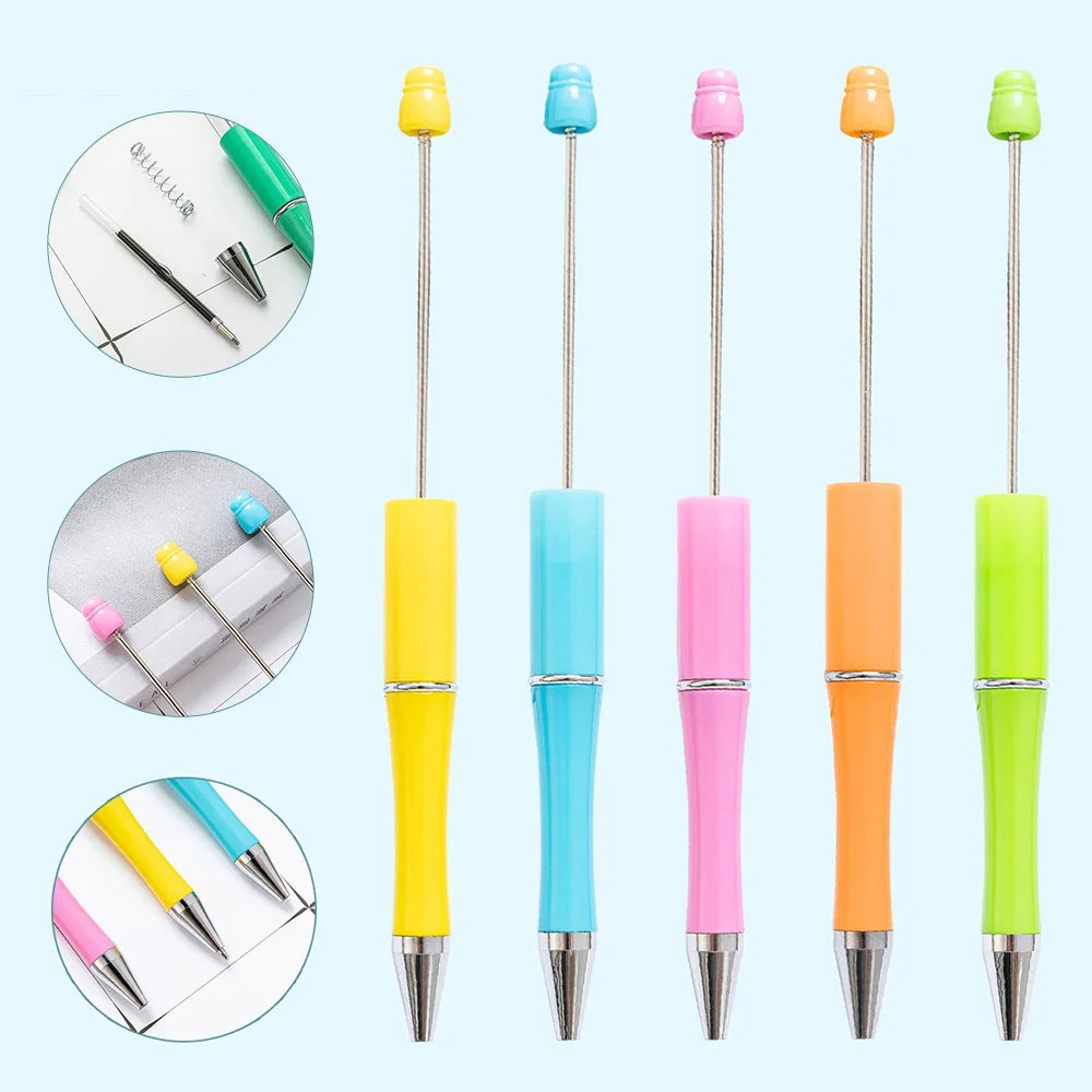 A set of personalizable beadable ballpoint pens in various colors including yellow, blue, pink, and orange.