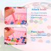 Instructions show how to attach and place beads onto a pink magnetic doodle board for kids.