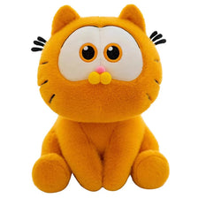 An orange Garfield plush doll with large eyes and a pink nose, sitting upright.