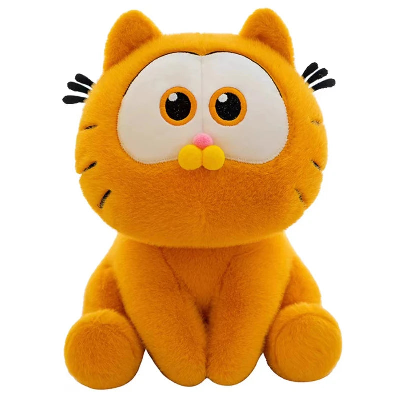 An orange Garfield plush doll with large eyes and a pink nose, sitting upright.