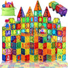 A colorful structure built from magnetic building blocks resembling a castle, with several blocks scattered nearby.