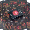 A stack of black cards from a 54-Card Oracle Deck for Love & Confession Messages with various messages