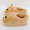 A pair of tan Rilakkuma plush indoor slippers lying on a white surface.
