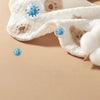A white baby bandana bib is shown with small red rashes and blue virus icons, emphasizing keeping away from rashes.