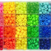 A variety of colorful pony beads and letter beads packaged in a clear plastic tray for DIY bracelet making.