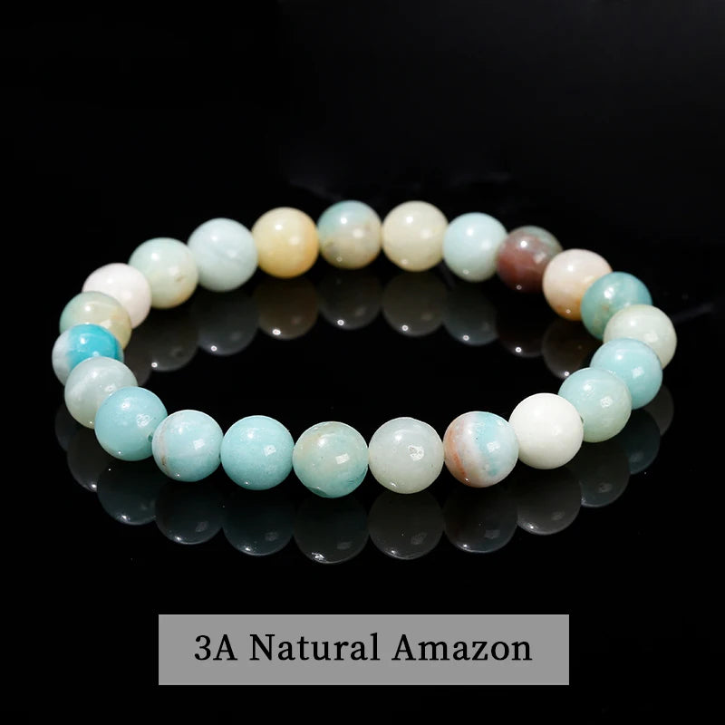 A bracelet made of small, round beads in various shades of pink and blue quartz.