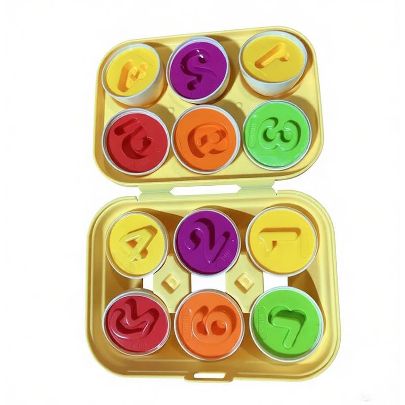 A yellow plastic container holds multiple colored eggs with various shapes for a Montessori matching and sorting toy.